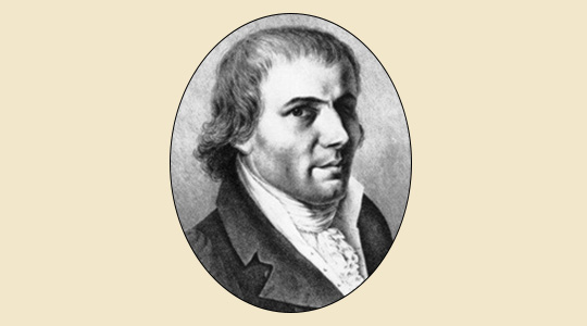 Portrait Joseph Utzschneider (1763-1840), Halbprofil mit dem Betrachter zugewandtem Gesicht. Utzschneider trägt eine  dunkle Jacke mit großem Kragen, ein Hemd mit weißer Stehkragen und einen, eng um den Hals geschlungenen, plissiertes Schal. 